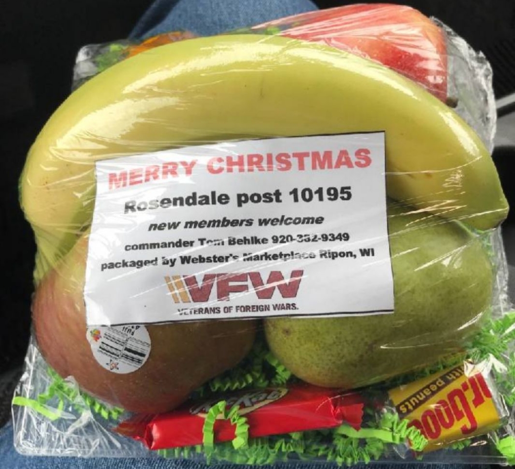 Each yeah, Chuck Rusch coordinates, organizes, and distributes holiday fruit baskets to surrounding seniors in the community.